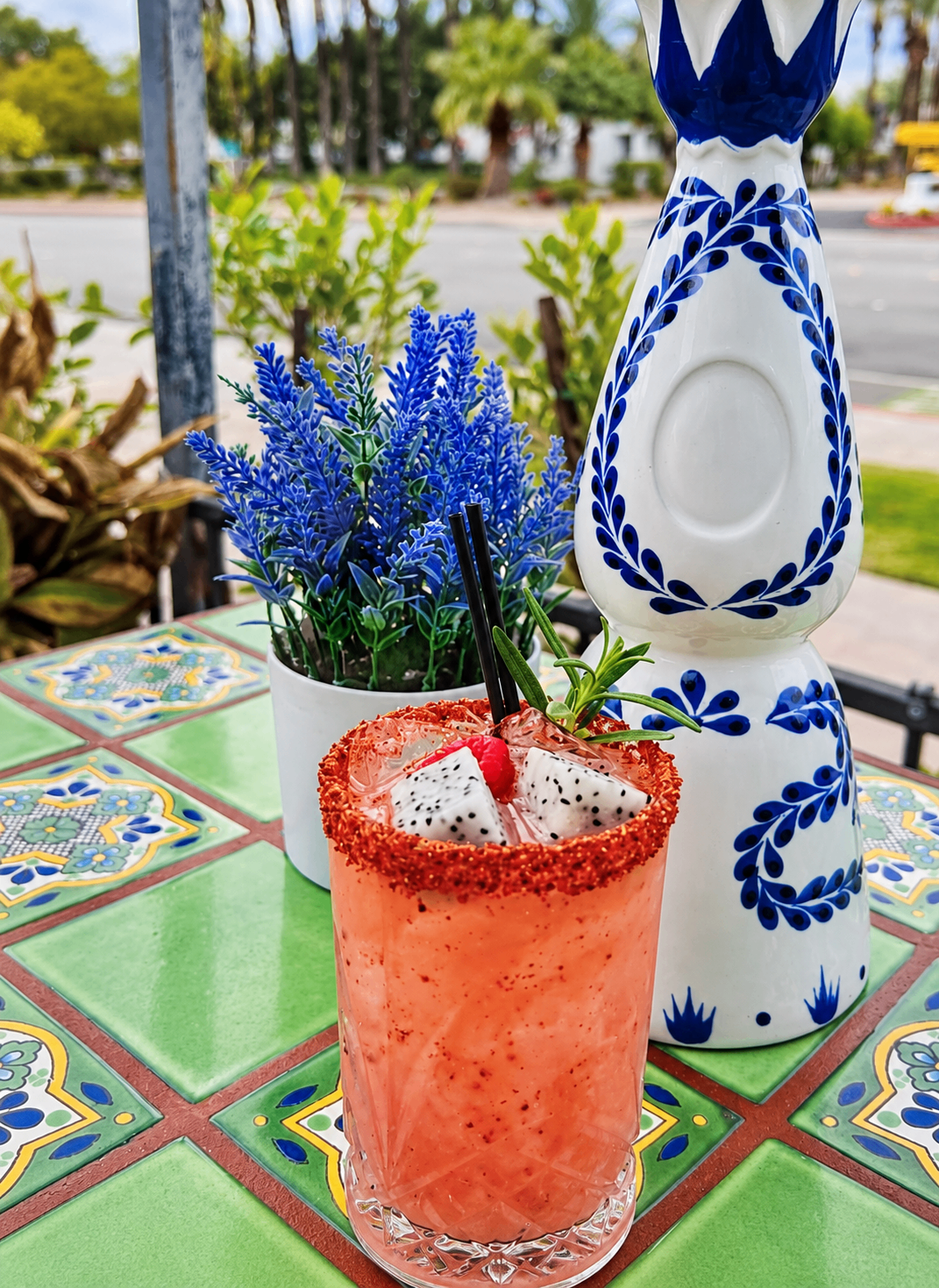A pink dragon fruit margarita on Felipe’s tiled patio